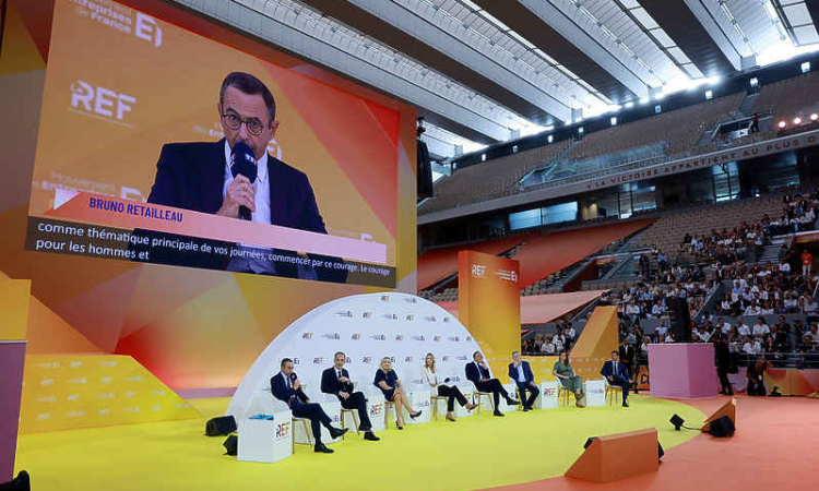 Le Pen seeks to woo top French  business leaders at first debate